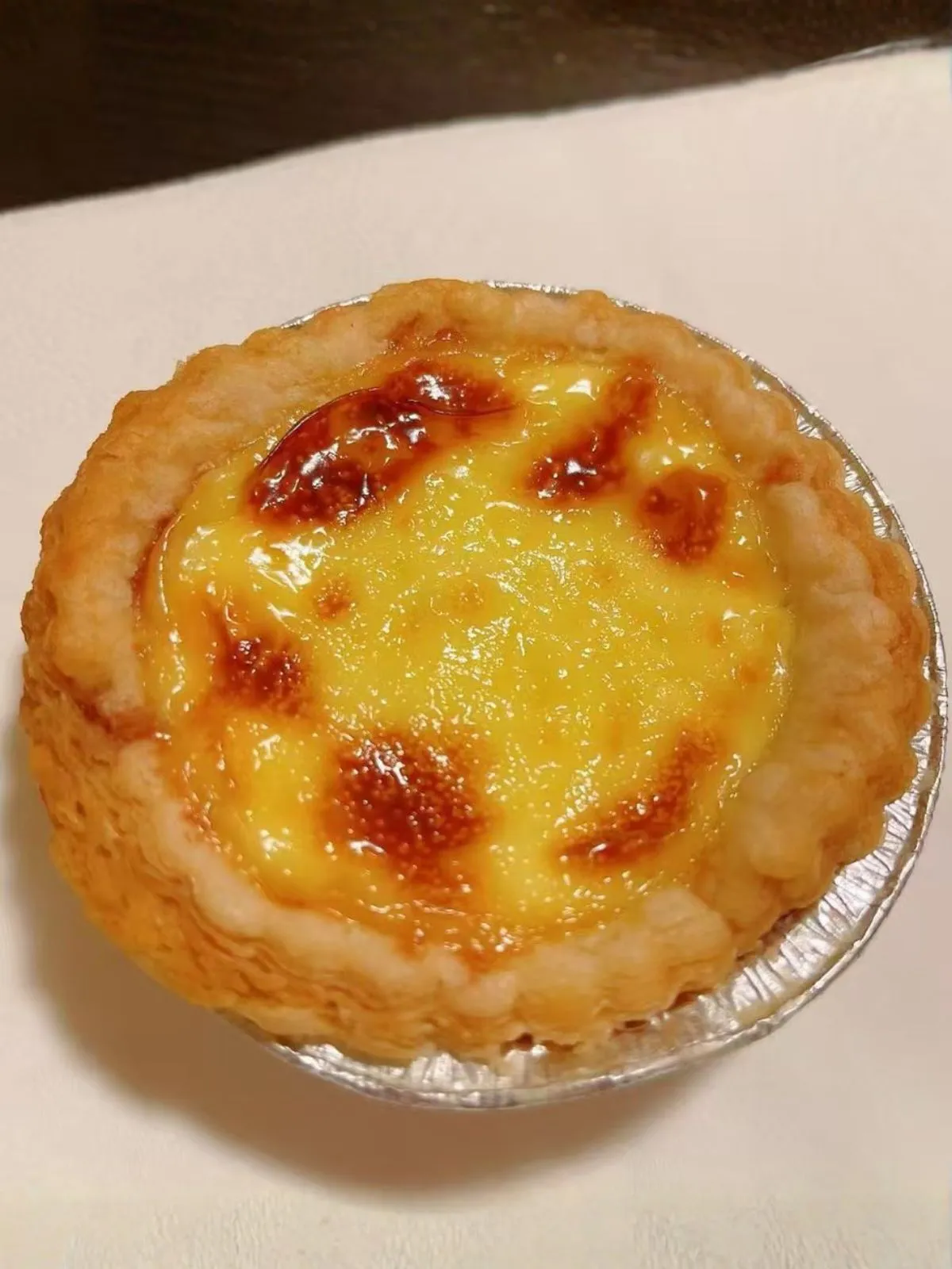 Flaky egg tart dessert at Chang An Taste, a Chinese Restaurant in Denver